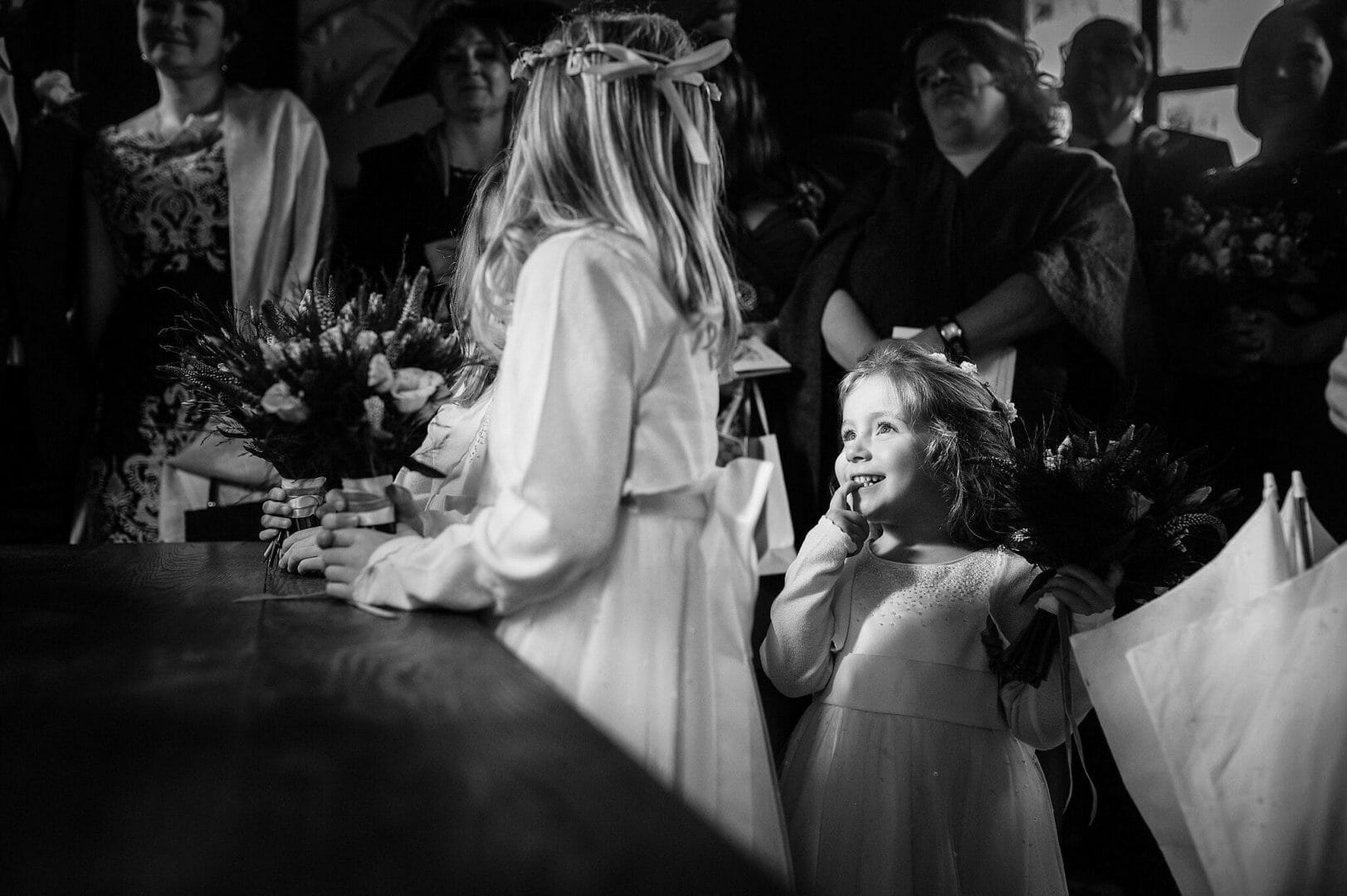 Larmertree garden wedding 58 Cute Flowergirl in the Temple at Larmertree Gardens