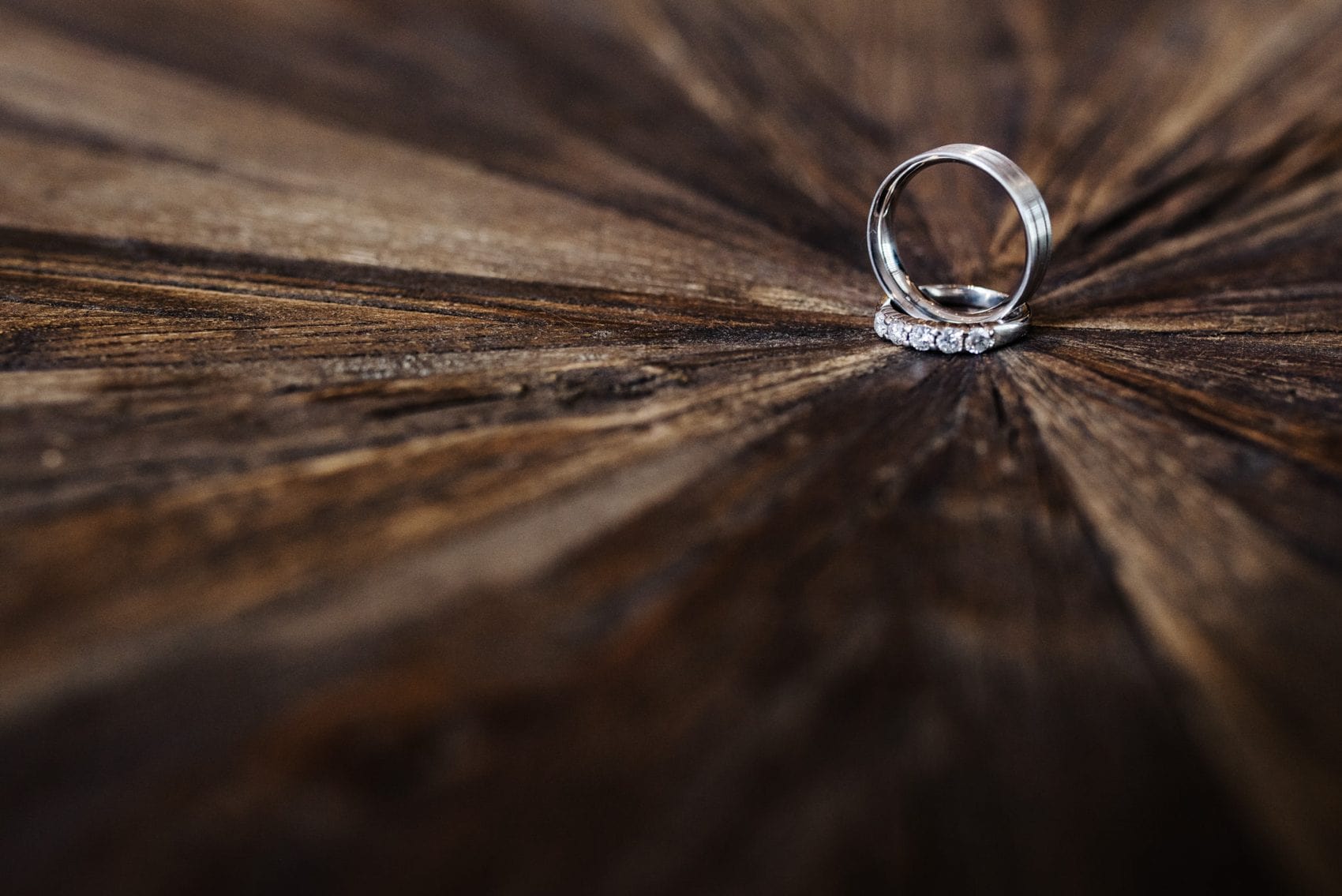 How to pull off an environmentally friendly destination wedding 12 Wedding ring detail on wood