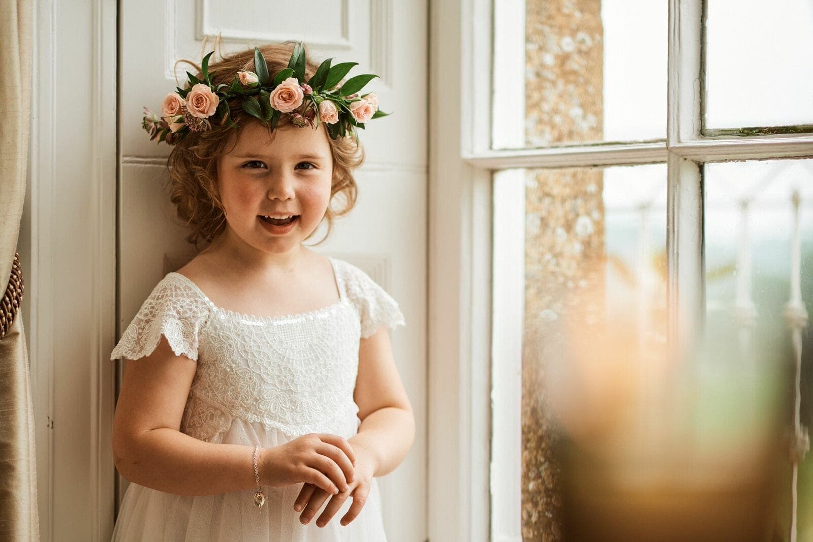 Flower girl in window - North Cadbury Court Wedding photographer