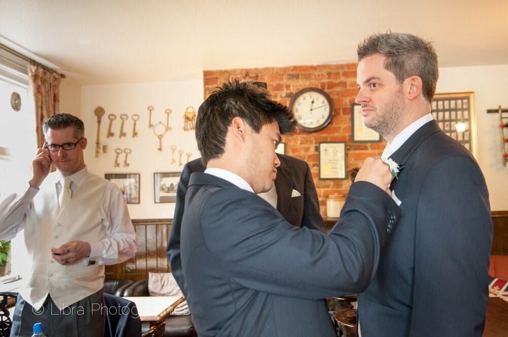 Groom and best man in pub
