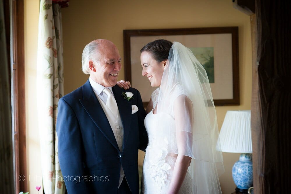Bride and Father laughing