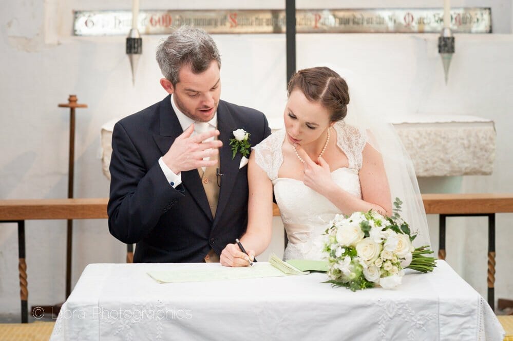 Couple signing the register