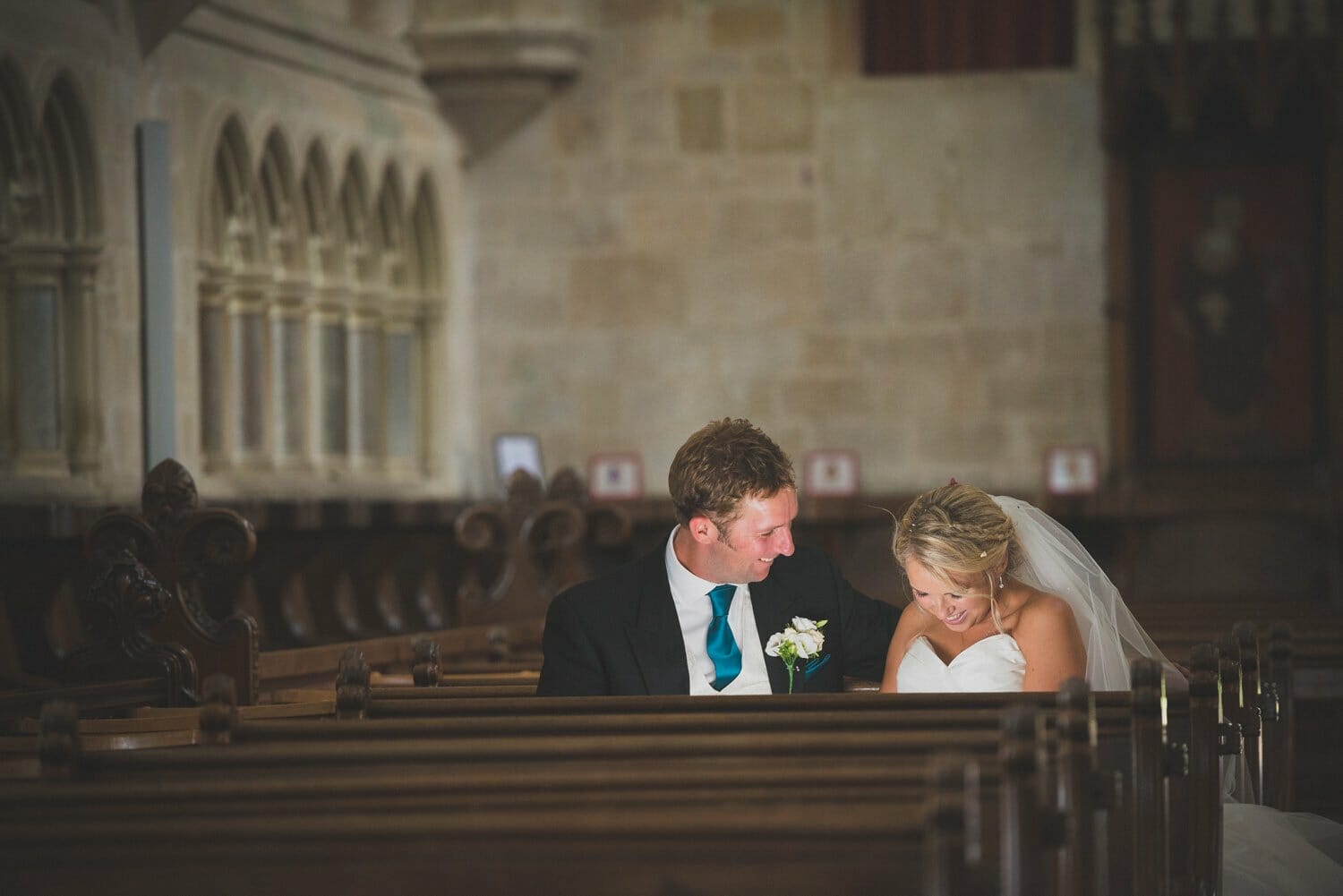 Bride and groom in the pews