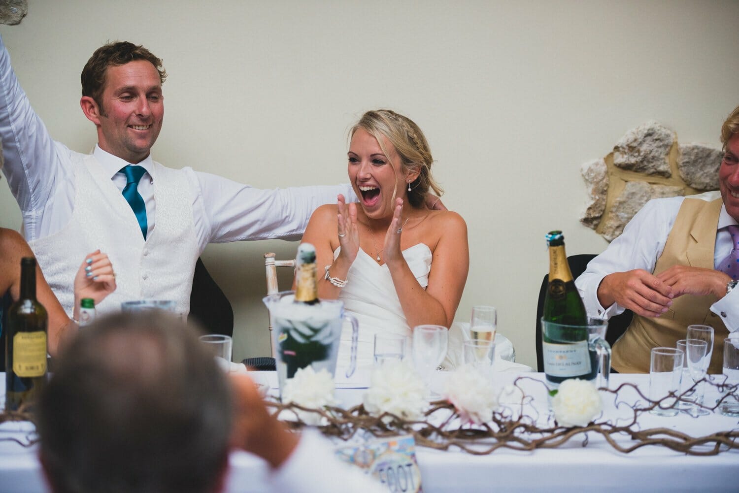 Bride laughs at speech Milton Abbey Wedding