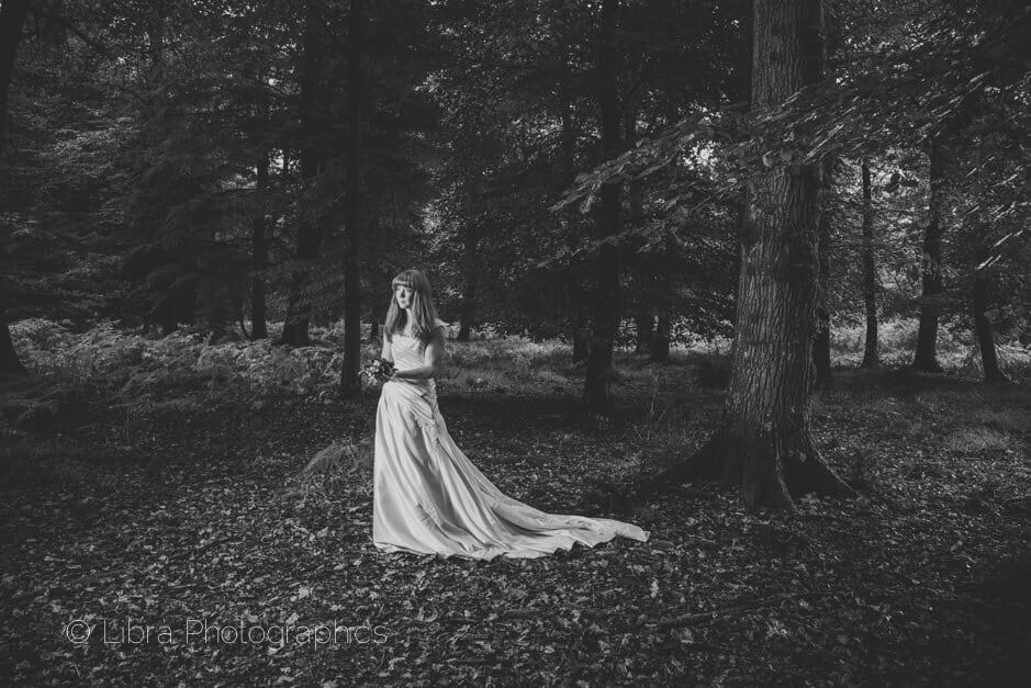 Bride posing in forest Vogue style